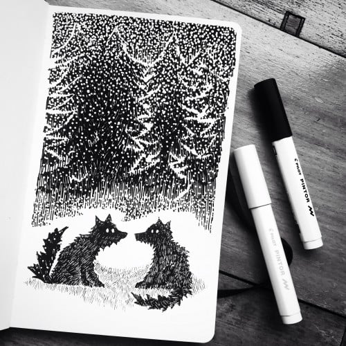 Wolves at snowy forest