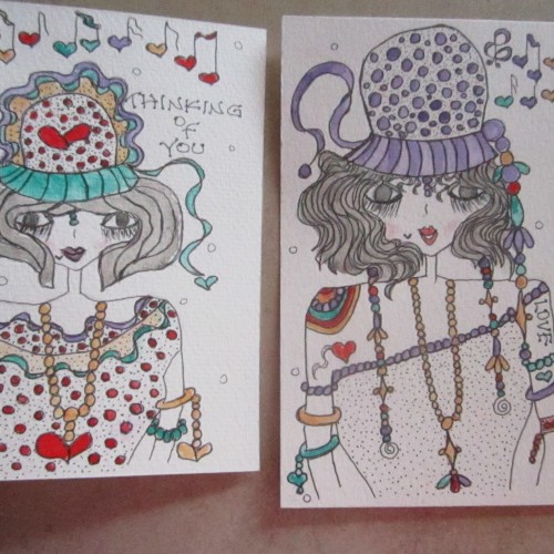 TWO DIFFERENT GREETING CARDS  