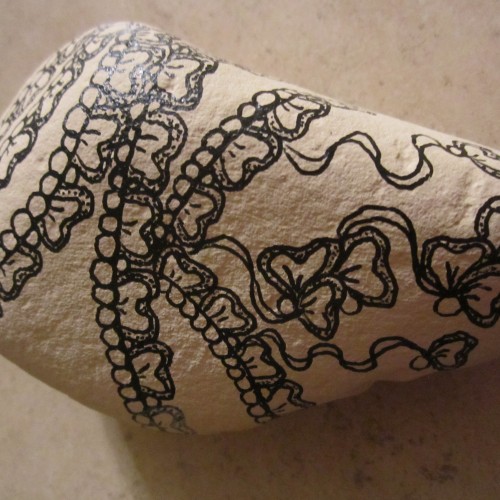 I JUST FOUND A ROCK THAT I DIDNT FINISH AS IT NEEDED SOMETHING ELSE ~ LIKE A NAME AND PAINT OR WHATEVER.