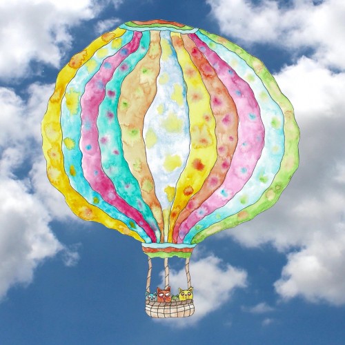 Kitties in a basket suspended from a balloon.