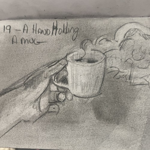 Hand Holding Mug