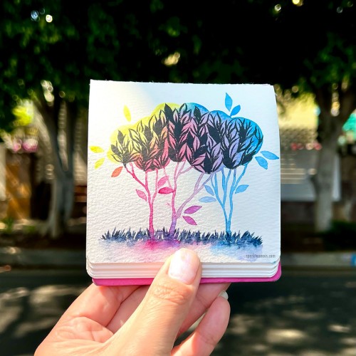 Painted my watercolor paint palette as colorful trees and ink leaves