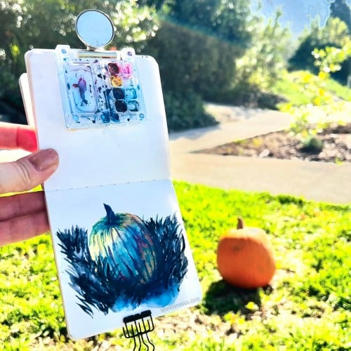 I painted this random pumpkin that unexpectedly appeared to be sunbathing